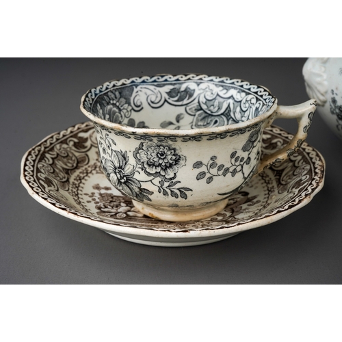 671 - An early 19th Century Davenport black and white part coffee service to include: two cups, three sauc... 