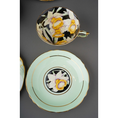 674 - A collection of Paragon china bowl cups and saucers to include: 
1. Queen Mary Warrant Daffodil brea... 