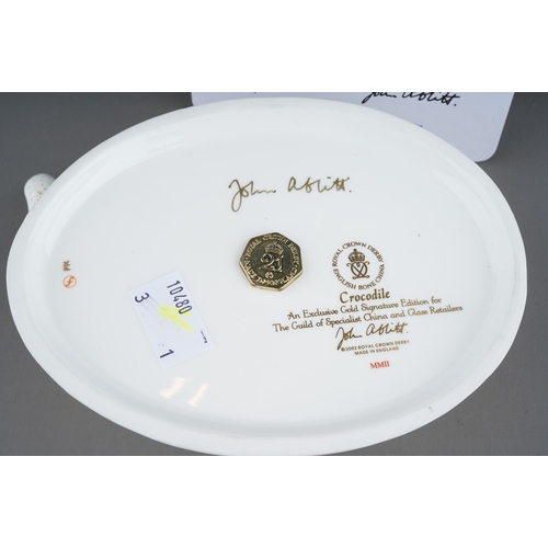 675 - A boxed Royal Crown Derby gold signature edition Crocodile paperweight, commissioned by The Guild of... 