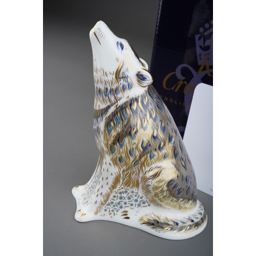 680 - A Royal Crown Derby limited edition Wolf paperweight, no.377 from a signature edition of 2500, gold ... 