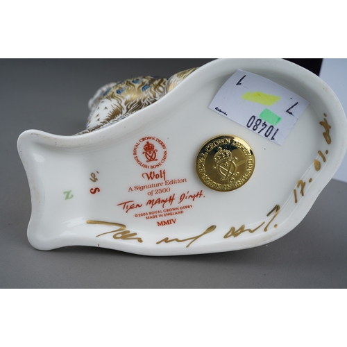 680 - A Royal Crown Derby limited edition Wolf paperweight, no.377 from a signature edition of 2500, gold ... 