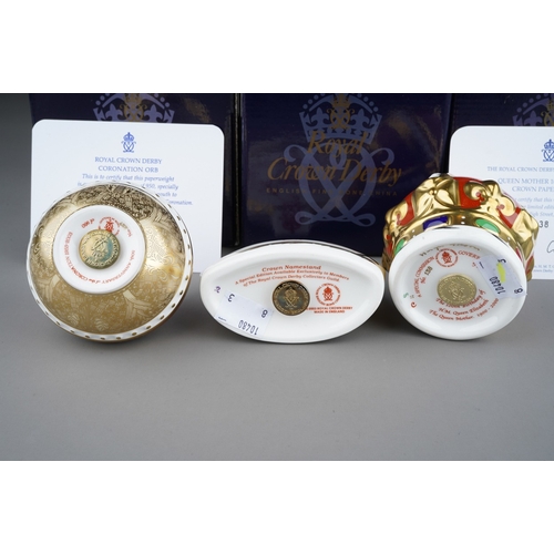 681 - Three boxed Royal Crown Derby paperweights, comprising a limited edition 