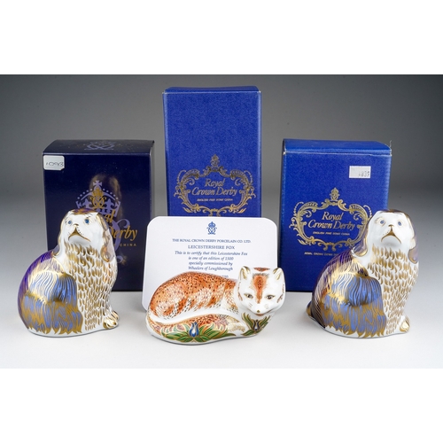 682 - Three boxed Royal Crown Derby paperweights, comprising two King Charles Spaniel paperweights, both l... 