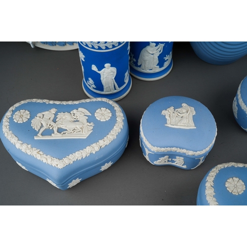 688 - A collection of Wedgwood and similar jasperware, including a pair of cylindrical spill vase, inscrib... 