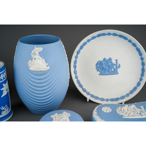 688 - A collection of Wedgwood and similar jasperware, including a pair of cylindrical spill vase, inscrib... 