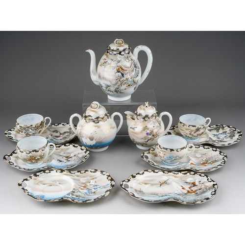 692 - An early 20th Century Japanese Noritake style eggshell porcelain tea set including teapot, hot water... 