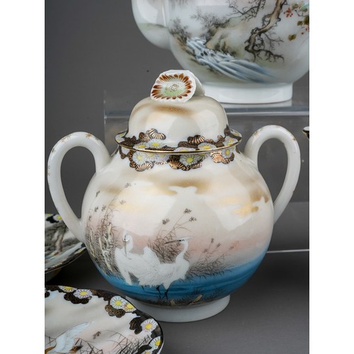 692 - An early 20th Century Japanese Noritake style eggshell porcelain tea set including teapot, hot water... 