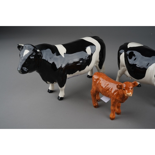 702 - Beswick Cattle to include: a Friesian Bull and Cow; CH Dunsley Coyboy Jersey bull and Jersey calf wi... 