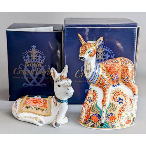 706 - Two boxed Royal Crown Derby paperweights, comprising a 'Holly' Donkey Foal, commissioned by Govier's... 