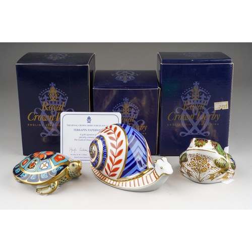 707 - Three boxed Royal Crown Derby paperweights, comprising 'Terrapin', with certificate, a limited editi... 