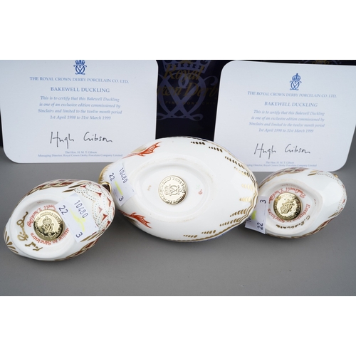 712 - Three boxed Royal Crown Derby paperweights, comprising a Duck and two 'Bakewell Duckling' commission... 