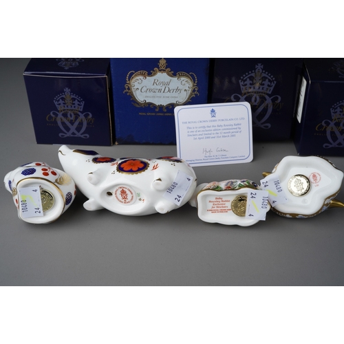 716 - Four boxed Royal Crown Derby paperweights, comprising a 'Baby Rowsley Bunny', with certificate, Twin... 