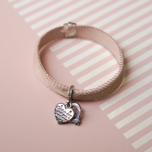 750 - A bracelet made from the bra strap of Lorraine Kelly’s bra and a heart charm.
Approx size W 8cm D 1c... 