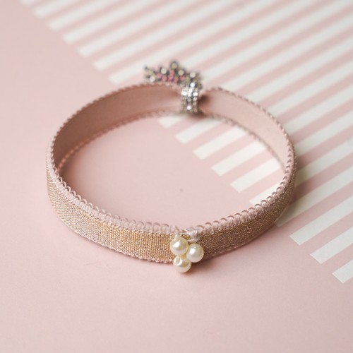 751 - A bracelet made from the bra strap of Lorraine Kelly’s bra and a star charm.
Approx size W 8.5cm D 1... 