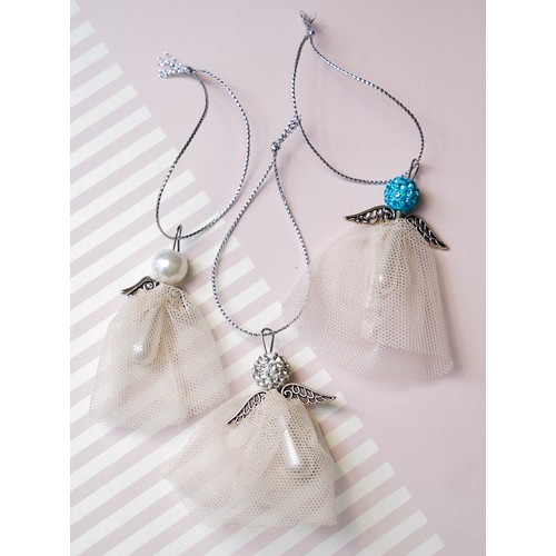 752 - Set of 3 Angel charms made from the lining of Lorraine Kelly’s bra and additional materials.
Each An... 