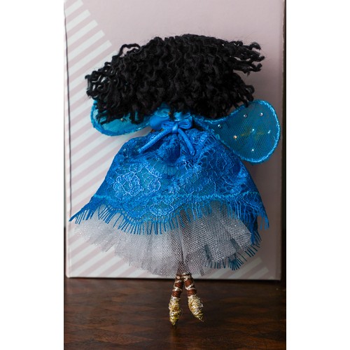 762 - A Fairy made from the fabric from Brenda Edward’s bra & additional materials. Approx size H 17 cm x ... 