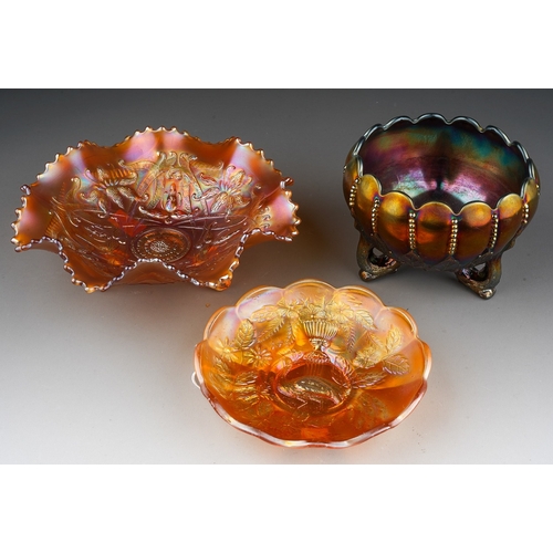 813 - Three pieces of early 20th century American Carnival glass from the Northwood factory , comprising a... 