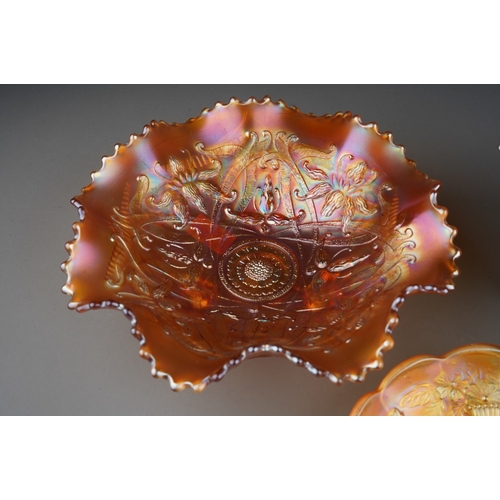 813 - Three pieces of early 20th century American Carnival glass from the Northwood factory , comprising a... 