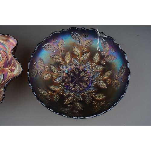 814 - Two pieces of early 20th century American Carnival glass from the Fenton factory, comprising a blue ... 