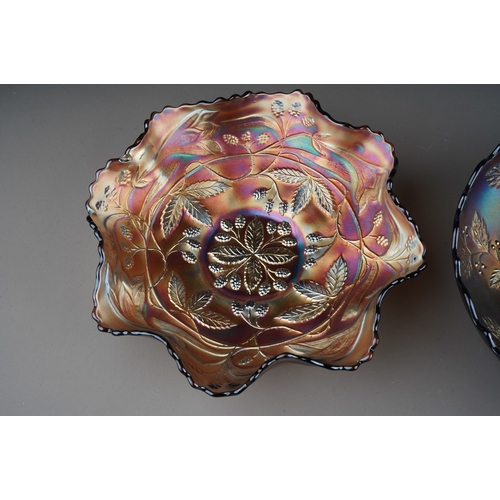 814 - Two pieces of early 20th century American Carnival glass from the Fenton factory, comprising a blue ... 