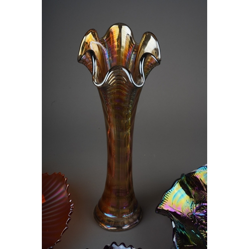 815 - Four pieces of early 20th century American Carnival glass from the Imperial factory, comprising an a... 