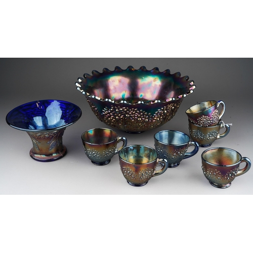 816 - An early 20th century American blue Carnival glass eight piece punch bowl set by the Fenton factory,... 