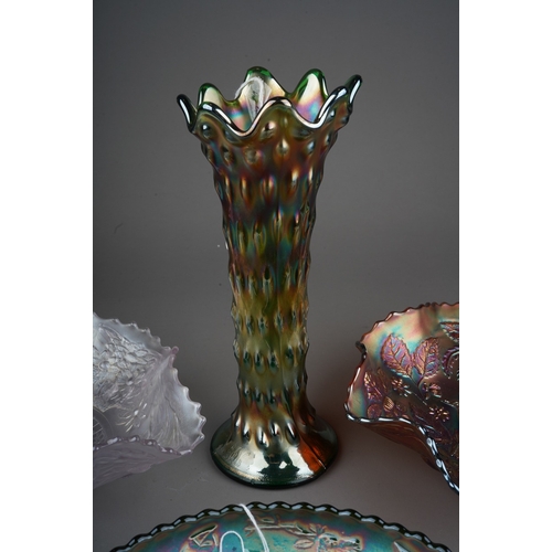 818 - Four pieces of early 20th century American Carnival glass from the Fenton factory, comprising a whit... 