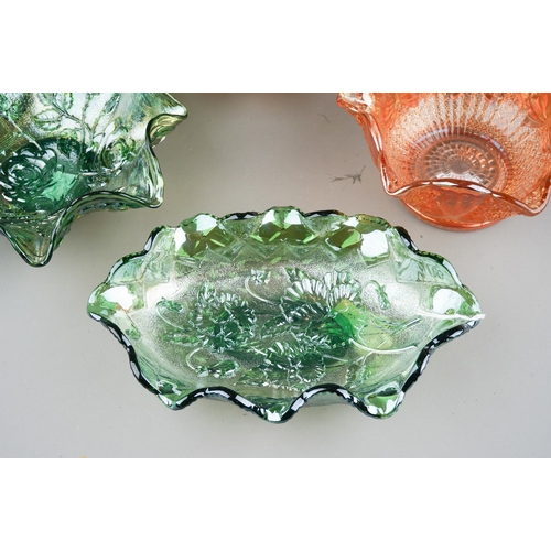 819 - Four pieces of early 20th century carnival glass, comprising two pieces of Imperial green glass, one... 