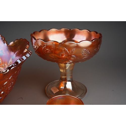 820 - An early 20th century American marigold and clear Carnival glass ten piece punch bowl set by the Dug... 