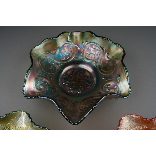 822 - Three pieces of early 20th century American Carnival glass from the Fenton factory, comprising a mar... 