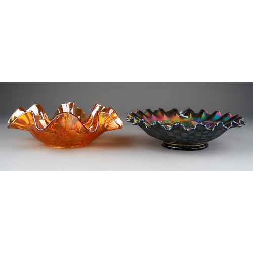 823 - Two pieces of early 20th century Carnival glass, comprising a Northwood amethyst wavy and frilled ri... 