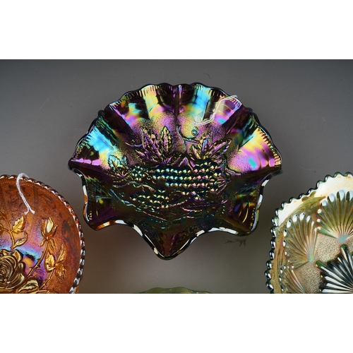 824 - Four pieces of early 20th century American Carnival glass from the Imperial factory, comprising a fr... 