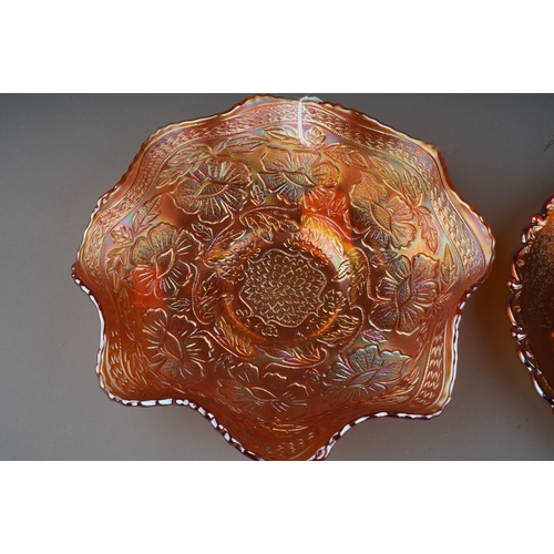 826 - Two 20th century American orange Carnival glass pieces from the Fenton factory, comprising a wavy ri... 