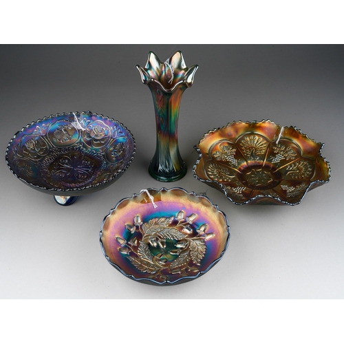 828 - Four pieces of early 20th century American Carnival glass from the Fenton factory, comprising a blue... 