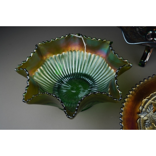 829 - Five pieces of early 20th century American Carnival glass from the Northwood factory, comprising a f... 