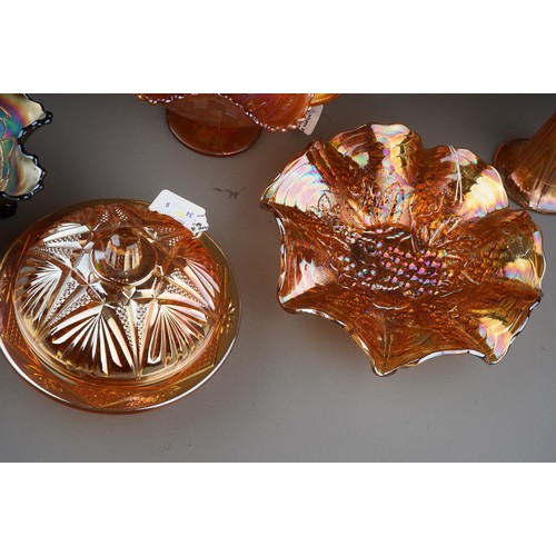 831 - Nine pieces of early 20th century American and European carnival glass, including pieces by Northwoo... 