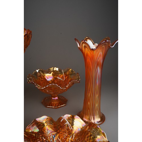 831 - Nine pieces of early 20th century American and European carnival glass, including pieces by Northwoo... 