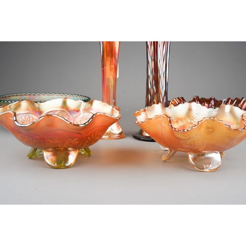 832 - Six pieces of early 20th century American Carnival glass from the Fenton factory, including a vaseli... 