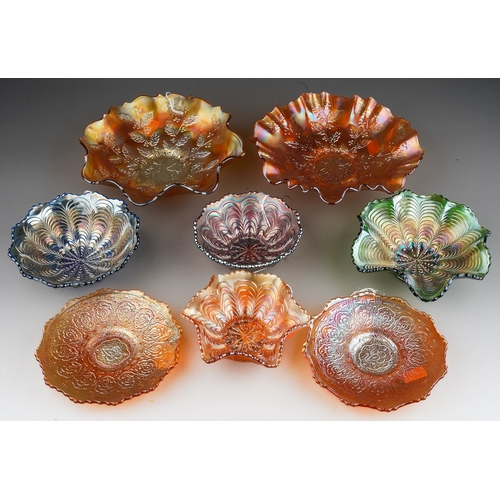 835 - Eight pieces of early 20th century American Carnival glass from the Fenton factory, including four s... 