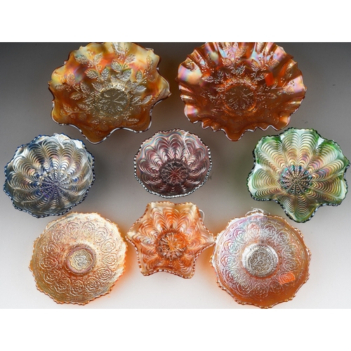 835 - Eight pieces of early 20th century American Carnival glass from the Fenton factory, including four s... 