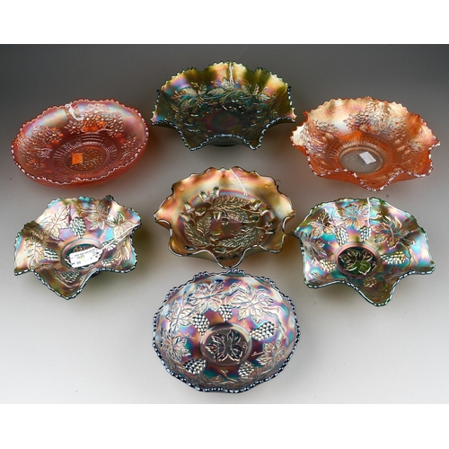 836 - Seven pieces of early 20th century American carnival glass from the Fenton factory, comprising three... 