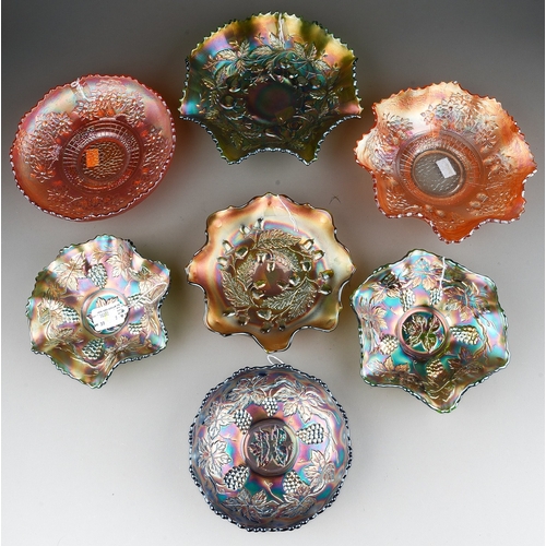 836 - Seven pieces of early 20th century American carnival glass from the Fenton factory, comprising three... 