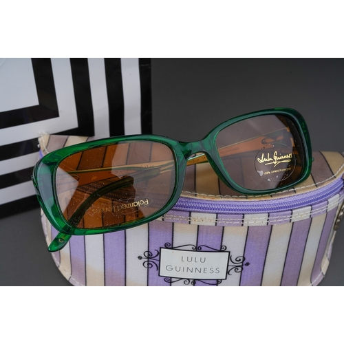 850 - Lulu Guinness; a pair of Green Tura sunglasses in original case (af, glassed with damaged package, g... 