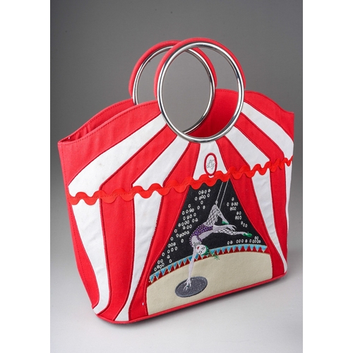 851 - Lulu Guinness: a red and white Circus or Trapeze girl canvas bag with loop handles together with a b... 