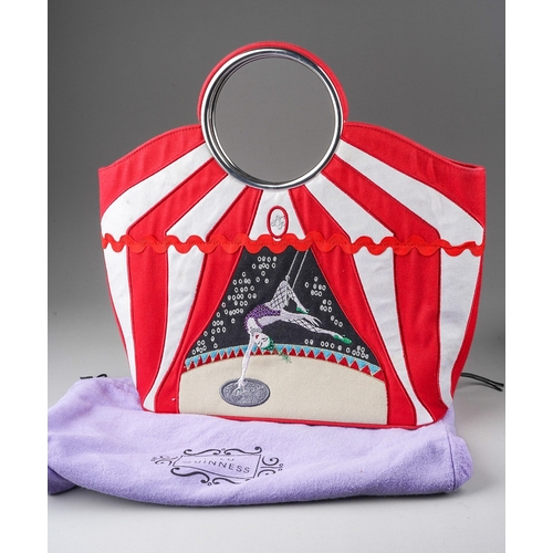 851 - Lulu Guinness: a red and white Circus or Trapeze girl canvas bag with loop handles together with a b... 