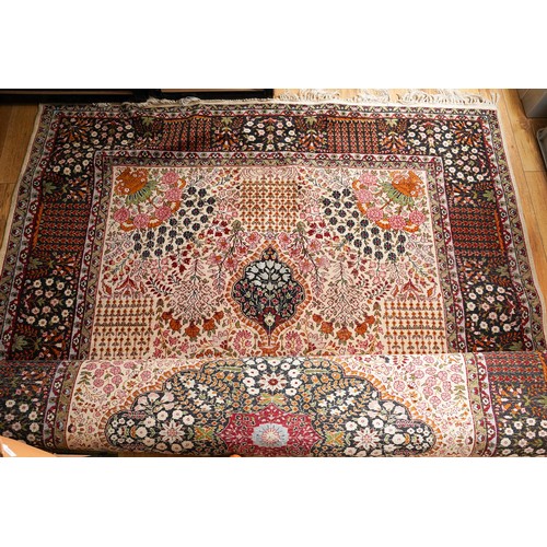 867 - A Turkish Silk rug in brown tones  180 X 254