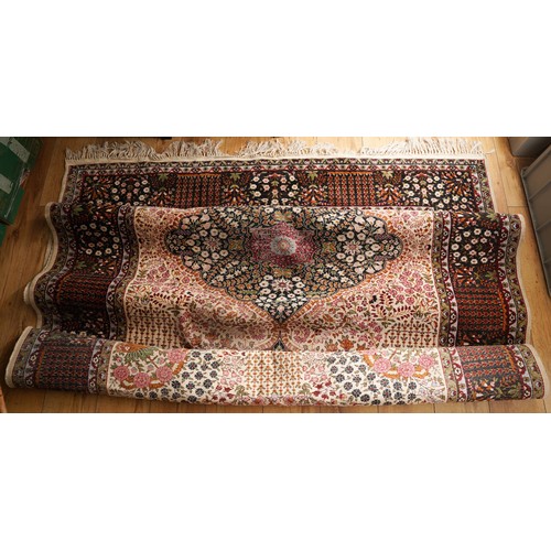 867 - A Turkish Silk rug in brown tones  180 X 254