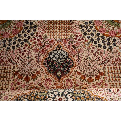 867 - A Turkish Silk rug in brown tones  180 X 254