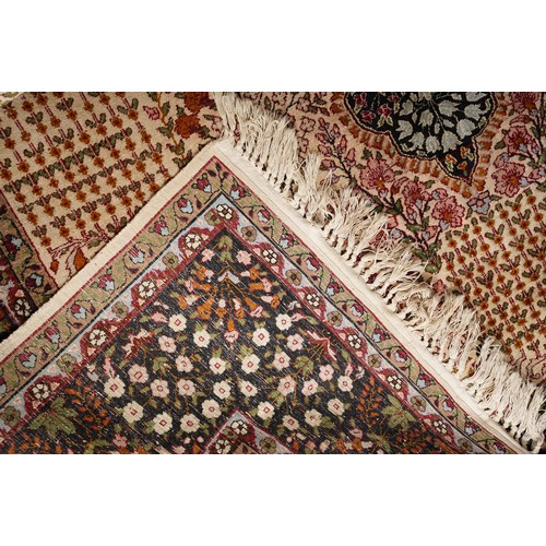 867 - A Turkish Silk rug in brown tones  180 X 254