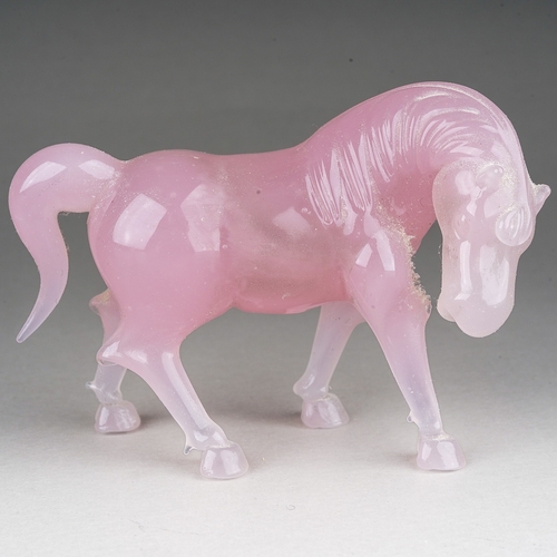 884 - A Peking pink opaque glass model of a horse, approx 8cm wide overall